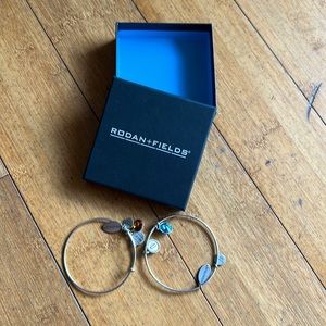 TWO Rodan + Fields Alex and Ani Bracelets